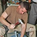 Capt. Rob Edwards busts plaster out of socket