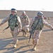 Medics carry a wounded Soldier to an ambulance