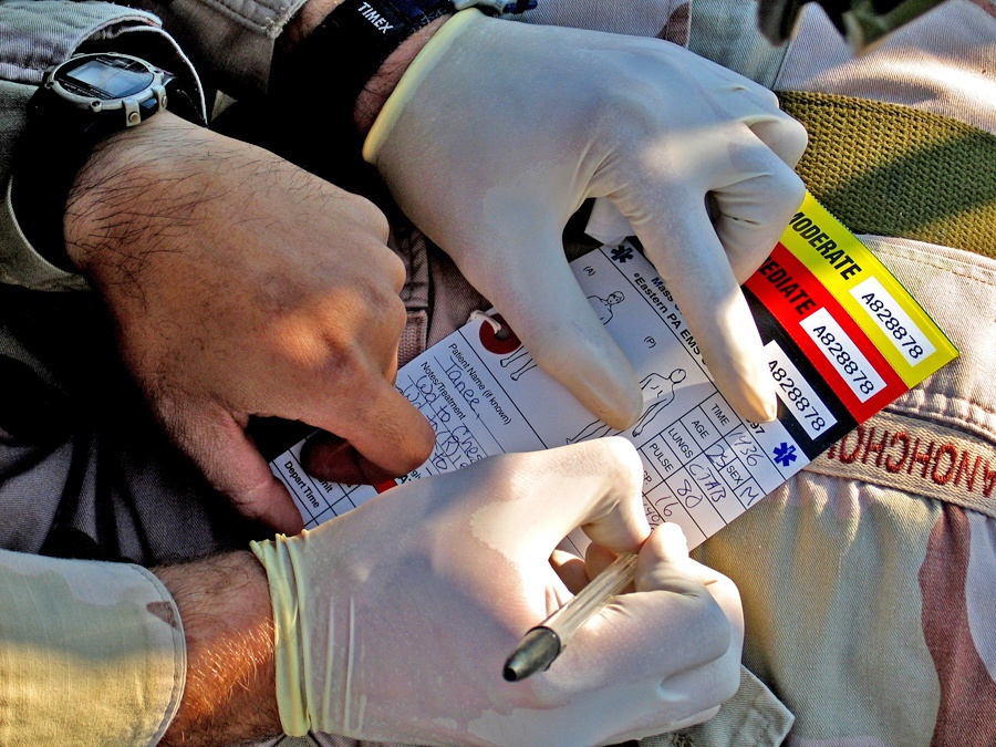 Medics Assess the Wounded Prior to Evacuation