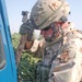 Sgt. Drumond inspecs an Iraqi vehicle at a checkpoint