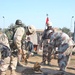 Lt. Col. James Mingo break ground at the site