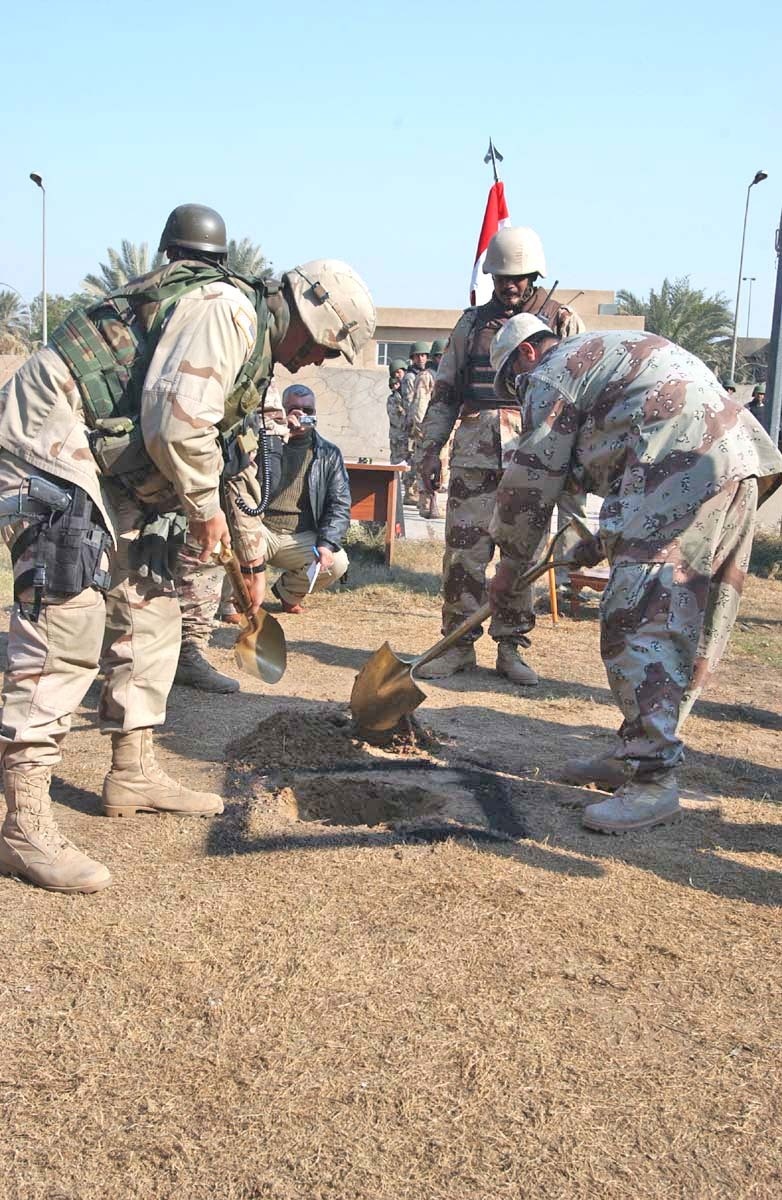 Lt. Col. James Mingo break ground at the site