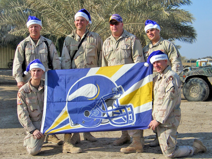 Soldiers record a holiday greeting to their favorite team