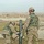 Soldiers fire mortars over the city of Tal Afar