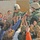 Soldiers hand out backpacks to rural Iraqi schoolchildren