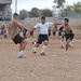 Mariwan Noory prepares to kick a soccer ball past Bravo Co. defe