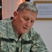 Gen. Schoomaker sign awards and reenlistment documents