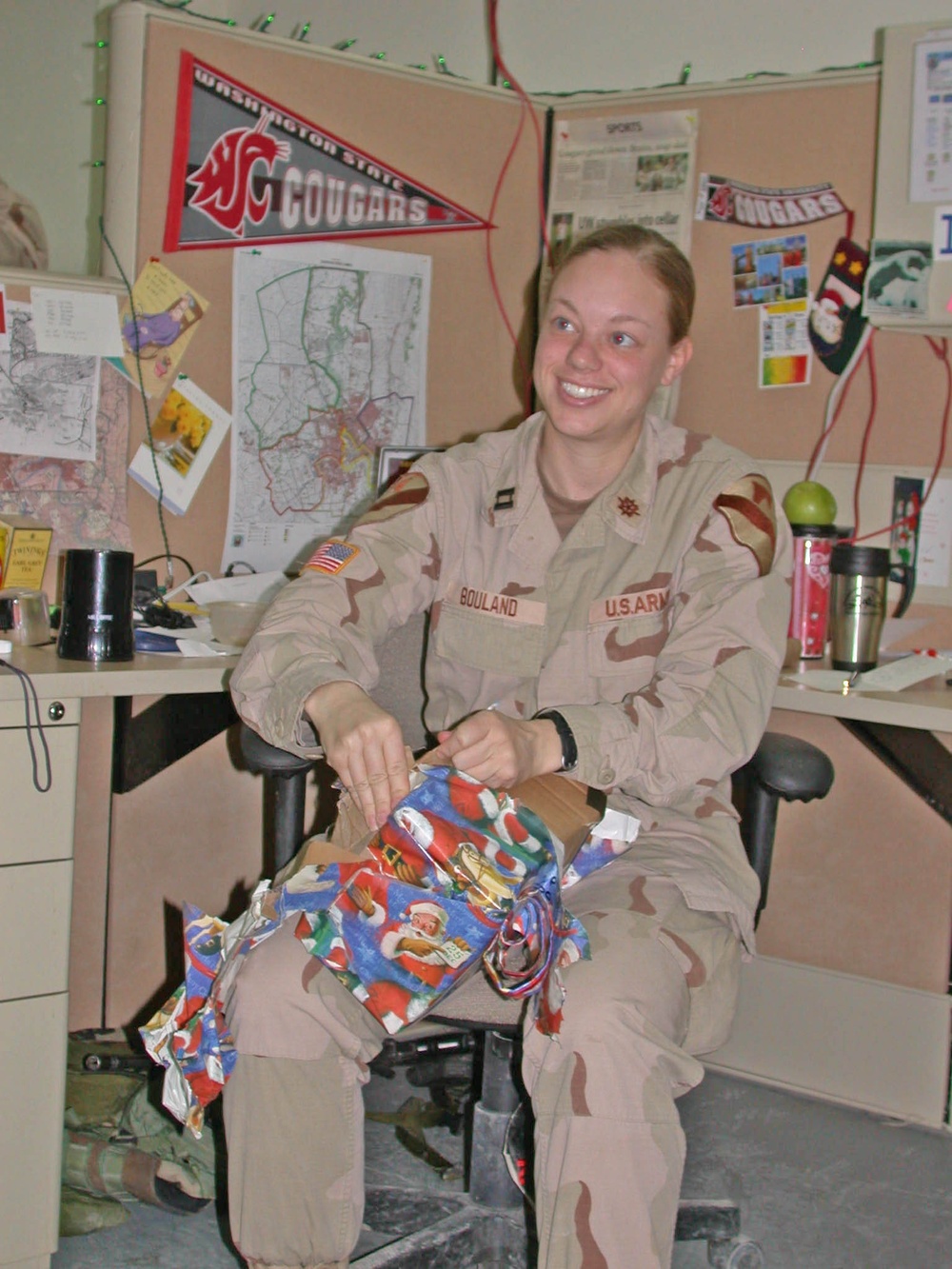 Capt. Jenny Bouland opens a present