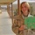 Spc. Jessica Stacy displays one of the hundreds of Christmas car
