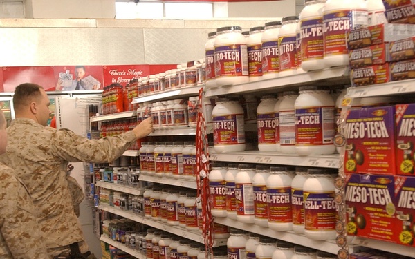 Soldiers look at supplements in the main PX/BX