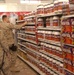 Soldiers look at supplements in the main PX/BX