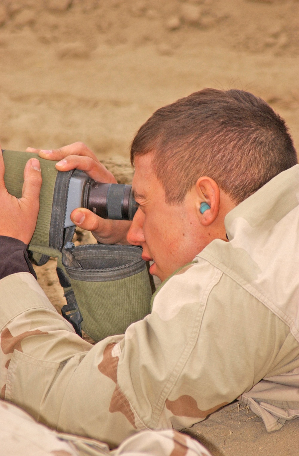 Spc. Hoyt, LRSD spotter, uses his spotter scope