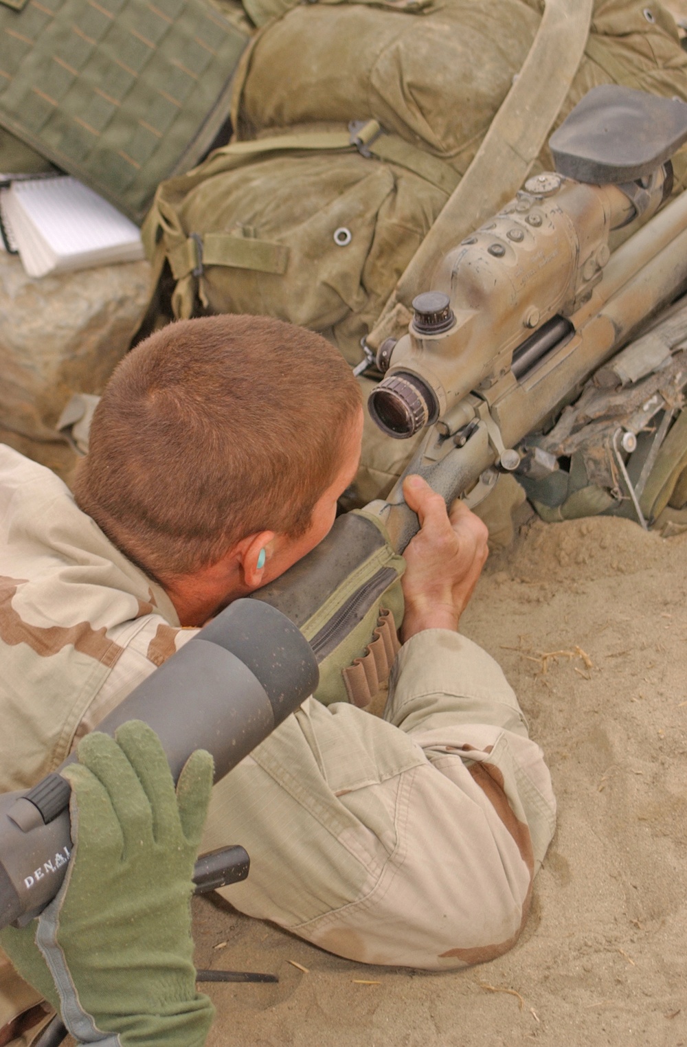 Spc. Joseph Crum fires the M-24 sniper rifle
