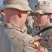 Spc. Roberts receives the Combat Medic Badge