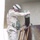 SFC Jeffery Demet pours gasoline into a generator