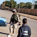 Spc. Eaton plays soccer with a young Iraqi boy