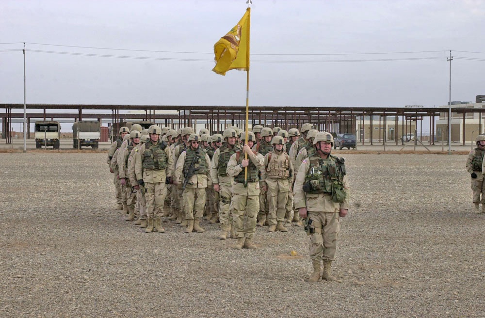 Soldiers stands at attention during the ceremony