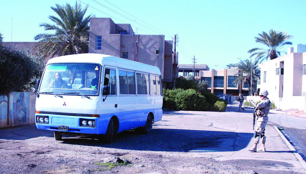 An interpreter parks a bus out side