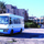An interpreter parks a bus out side