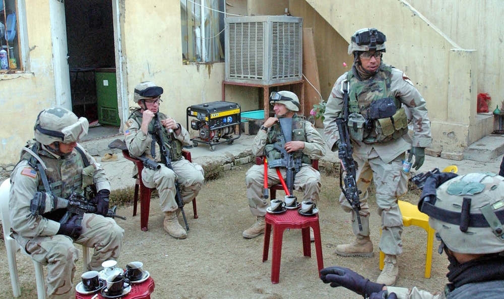 Soldiers take Iraq Chai at the home of a friendly