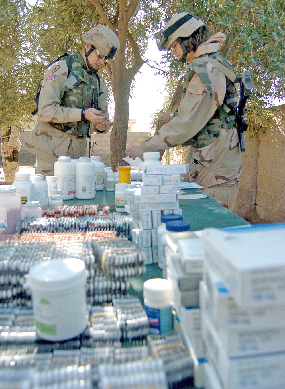 Medics prepare prescriptions for the medical assistance