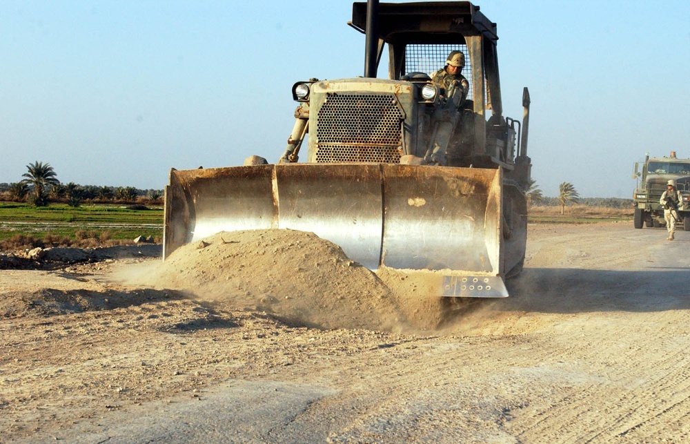 Spc. Leonard Hale fills a place in the road