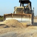 Spc. Leonard Hale fills a place in the road