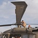 A MEDEVAC crew prepare their UH-60 Blackhawk helicopter