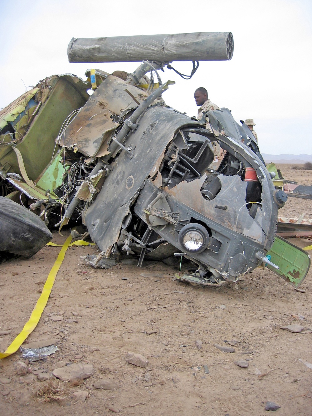 Soldiers work to remove the wreckage
