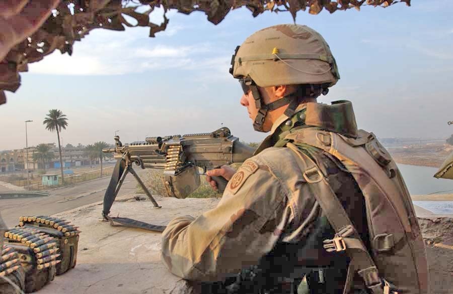 A paratrooper scans Haifa Street for signs of insurgent