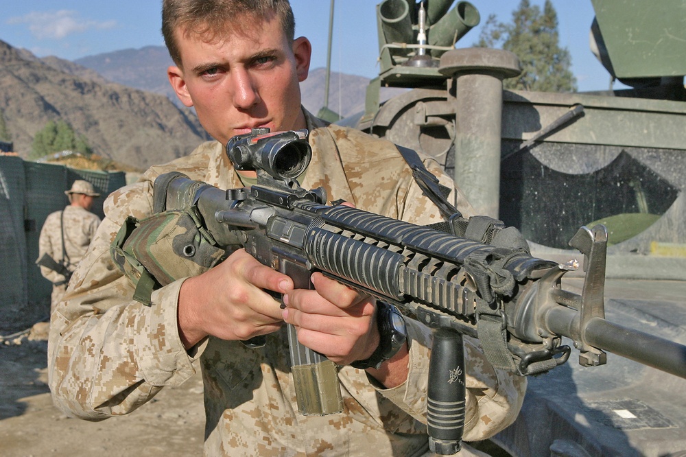 Sgt. Jason Burchs displays his M16 A4 rifle