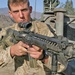 Sgt. Jason Burchs displays his M16 A4 rifle