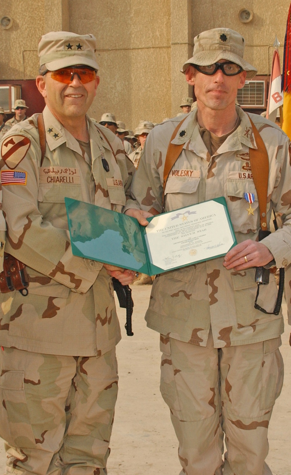 Lt. Col Volesky is congratulated by Maj. Gen. Peter Chiarelli