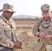 Soldiers shares a laugh with Maj. Gen. Bennett C. Landreneau