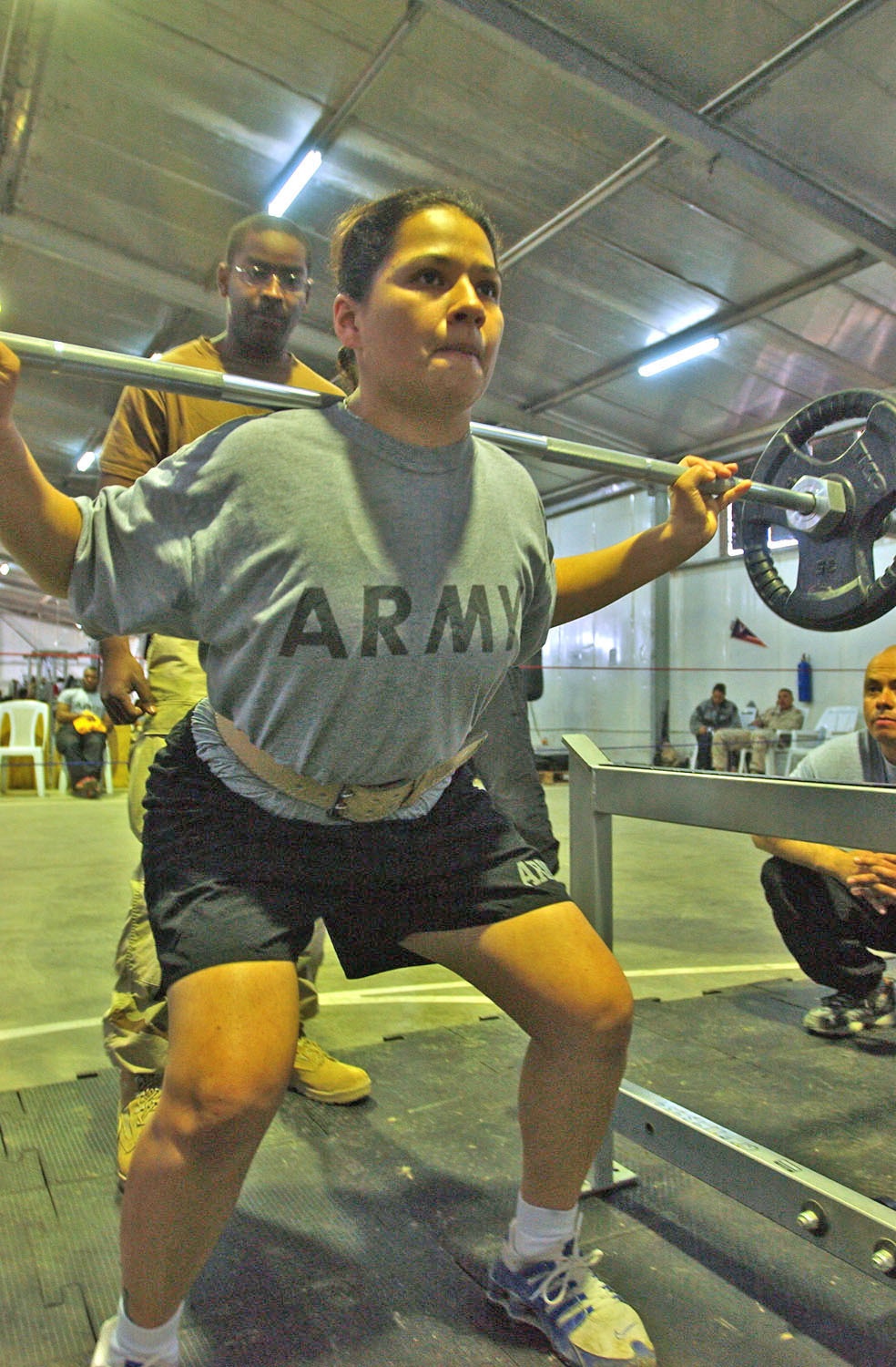 Sgt. LeAnn Banda squats 115 lbs as part of three events