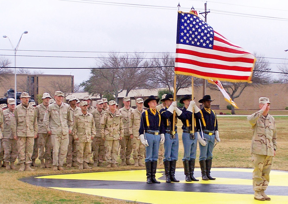 Soldiers stand in formation during a brief welcoming ceremony