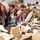 Locals rummage through boxes delivered by Soldiers