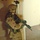 A Soldier stands guard at an open doorway