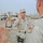 Brig. Gen. Ron Chastain swears in a group of Soldiers