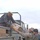 1st Lt. Wilkerson reaches for a box being handed down