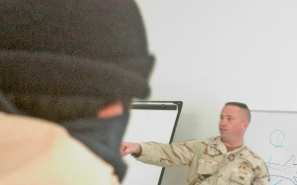 Sgt Robert Appel demonstates how to appy a tourniqute