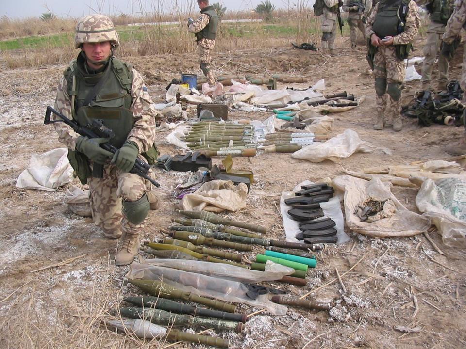 A Task Force Baghdad Marine stands guard