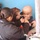 Spc. Jasmine Smith administers a dose of dewormer to Seyar