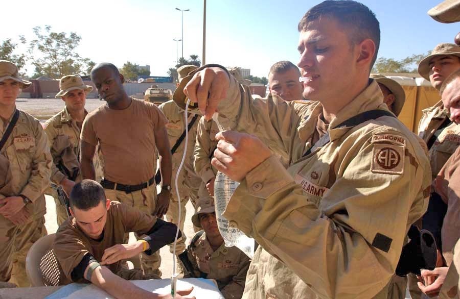 Spc. Josh McElroy instructs paratroopers