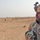 Staff Sgt. Akinola Oladipo looks on