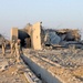 Task Force Baghdad Soldiers look through the rubble