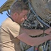 Sgt. David Wood replaces an engine in one of 14 Chinook