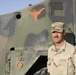 SSgt Shawn Hogan poses and enters his Heavy Equipment Transport