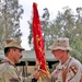 Lt. Col. Hussein Musin Bahar Al-Freejy receives colors