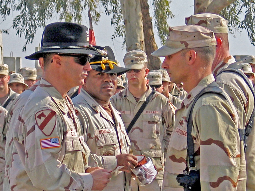 Colonel Chris Cox presents the coveted 1CD combat patch